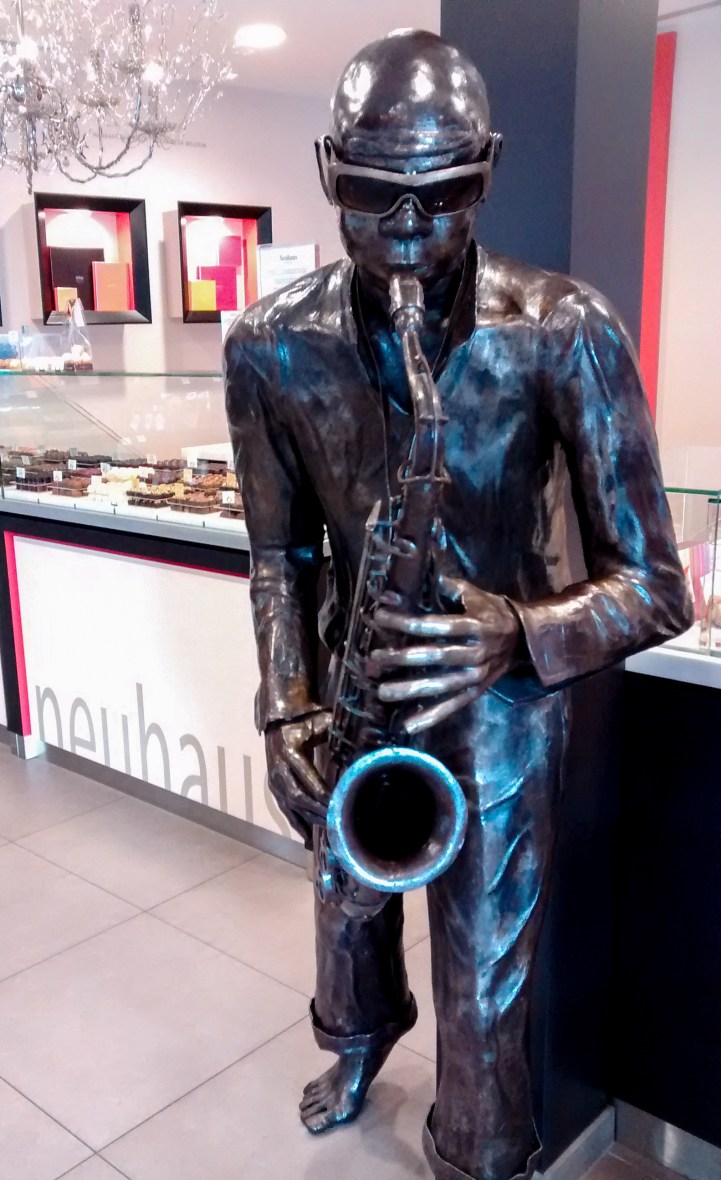 Dinant Belgium - Sax Player in chocolate shop